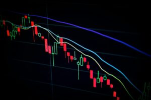 Stock market candlestick chart showing declining prices