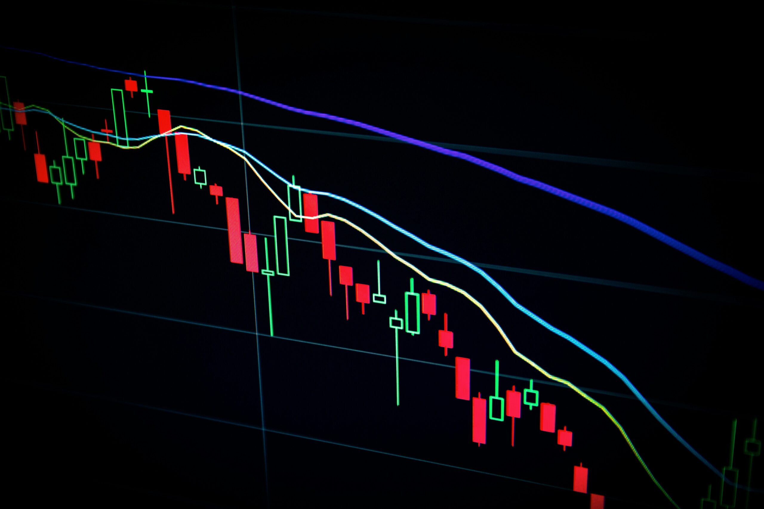 Stock market candlestick chart showing declining prices